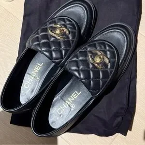 CHANEL Black Loafers with Gold Logo